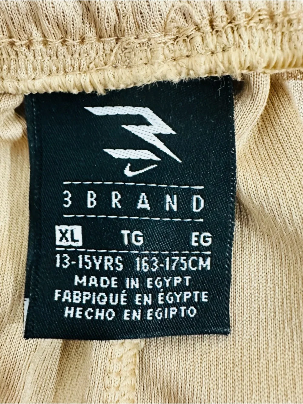 Nike Kids Beige/Tan Athletic Shorts with White Logos